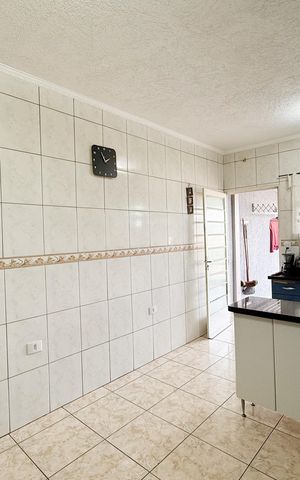 Casa à venda com 150m², 2 quartos e 2 vagas Casa à venda com 150m², 2 quartos e 2 vagasCozinha