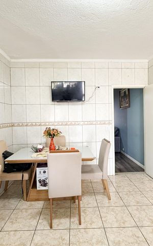 Casa à venda com 150m², 2 quartos e 2 vagas Casa à venda com 150m², 2 quartos e 2 vagasCozinha