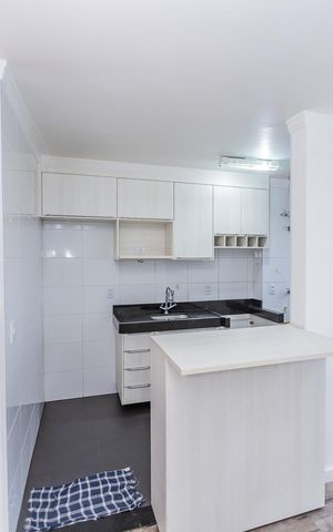 Apartamento para alugar com 45m², 2 quartos e 1 vaga Apartamento para alugar com 45m², 2 quartos e 1 vagaCozinha e Área de Serviço
