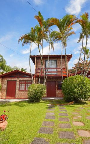 Casa de condomínio para alugar com 79m², 2 quartos e 1 vagaFachada/Garagem 
