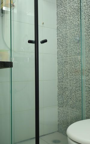 Casa de condomínio à venda com 63m², 2 quartos e 1 vagaBanheiro 1 - Suíte 1
