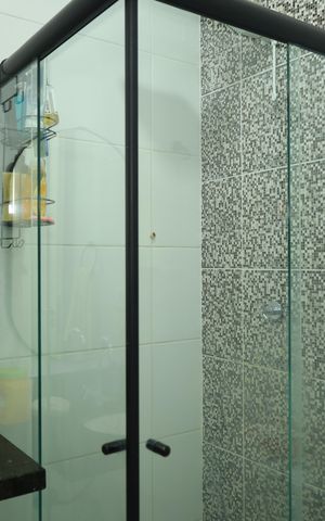 Casa de condomínio à venda com 63m², 2 quartos e 1 vagaBanheiro 1 - Suíte 1
