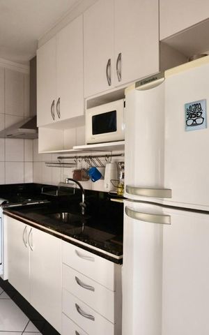 Apartamento à venda com 54m², 1 quarto e 1 vaga Apartamento à venda com 54m², 1 quarto e 1 vagaCozinha e Área de Serviço