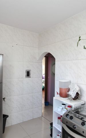 Apartamento à venda com 48m², 2 quartos e 1 vaga Apartamento à venda com 48m², 2 quartos e 1 vagaCozinha e Área de Serviço