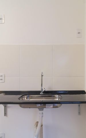 Apartamento para alugar com 54m², 2 quartos e 1 vaga Apartamento para alugar com 54m², 2 quartos e 1 vagaCozinha e Área de Serviço