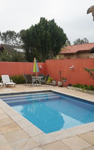 Casa de condomínio para alugar com 376m², 4 quartos e 4 vagasPiscina