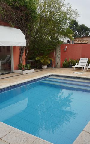 Casa de condomínio para alugar com 376m², 4 quartos e 4 vagasPiscina