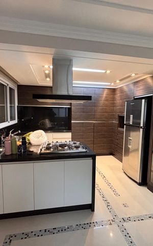 Casa à venda com 277m², 4 quartos e 4 vagas Casa à venda com 277m², 4 quartos e 4 vagasCozinha