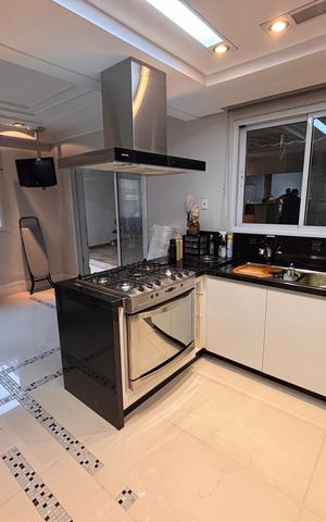 Casa à venda com 277m², 4 quartos e 4 vagas Casa à venda com 277m², 4 quartos e 4 vagasCozinha