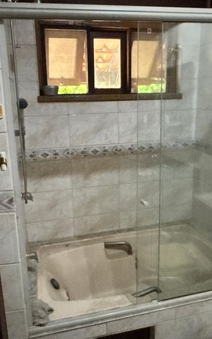 Casa de condomínio para alugar com 250m², 3 quartos e 8 vagasBanheiro da Suíte