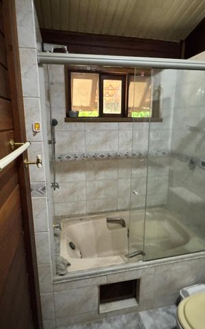 Casa de condomínio para alugar com 250m², 3 quartos e 8 vagasBanheiro da Suíte