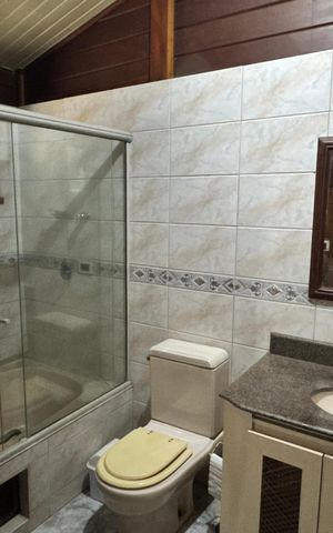 Casa de condomínio para alugar com 250m², 3 quartos e 8 vagasBanheiro da Suíte