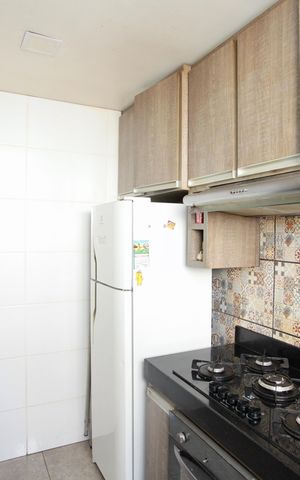 Apartamento à venda com 45m², 2 quartos e 1 vaga Apartamento à venda com 45m², 2 quartos e 1 vagaCozinha e Área de Serviço