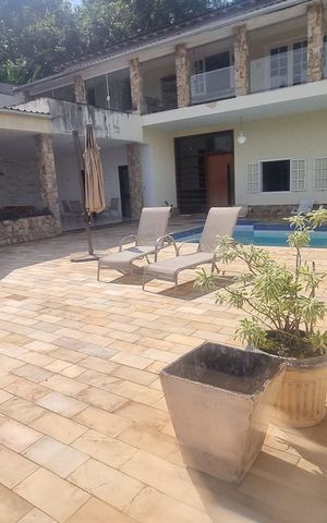 Casa de condomínio à venda com 1251m², 6 quartos e 5 vagas Casa de condomínio à venda com 1251m², 6 quartos e 5 vagasÁrea externa