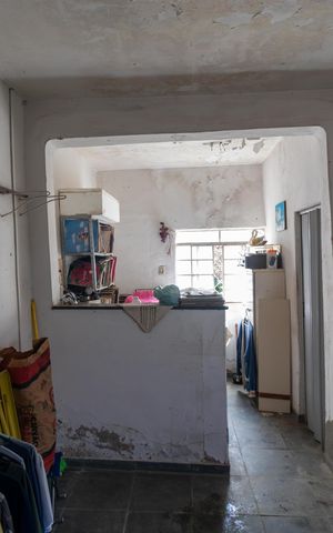 Casa à venda com 250m², 2 quartos e 3 vagas Casa à venda com 250m², 2 quartos e 3 vagasSala e Cozinha da casa 02