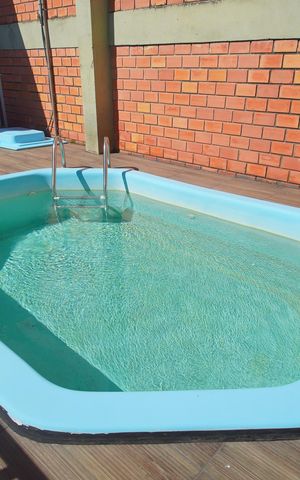 Casa para alugar com 70m², 2 quartos e 1 vagaÁrea comum - Piscina