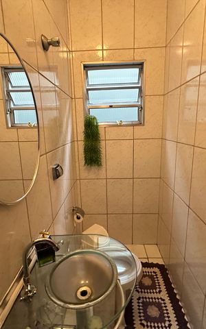 Casa à venda com 134m², 2 quartos e 2 vagas Casa à venda com 134m², 2 quartos e 2 vagasLavabo