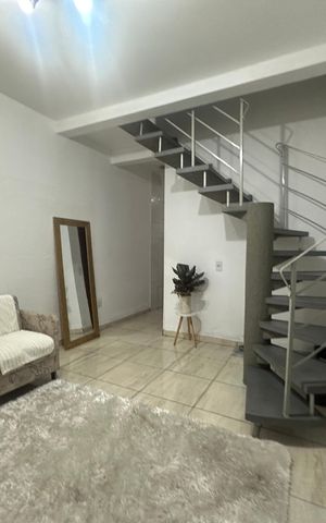 Casa à venda com 134m², 2 quartos e 2 vagas Casa à venda com 134m², 2 quartos e 2 vagasSala