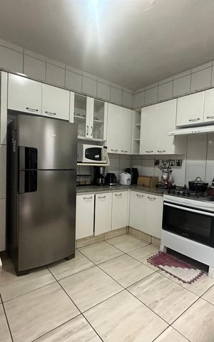Casa à venda com 134m², 2 quartos e 2 vagas Casa à venda com 134m², 2 quartos e 2 vagasCozinha