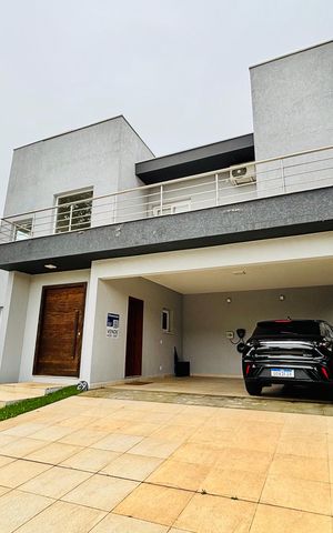 Casa de condomínio à venda com 480m², 4 quartos e 4 vagasFachada da casa 