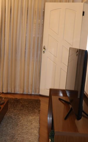 Casa para alugar com 100m², 2 quartos e 2 vagasSala