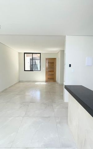 Casa à venda com 102m², 3 quartos e 2 vagas Casa à venda com 102m², 3 quartos e 2 vagasCozinha