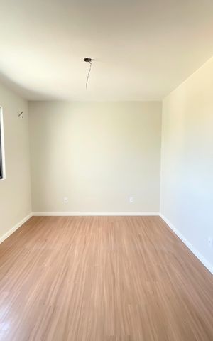 Casa à venda com 102m², 3 quartos e 2 vagas Casa à venda com 102m², 3 quartos e 2 vagasQuarto