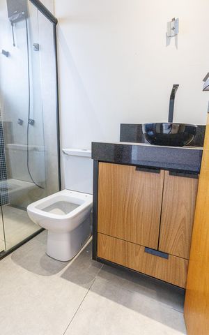 Casa de condomínio para alugar com 267m², 3 quartos e 4 vagasBanheiro da Suíte 2