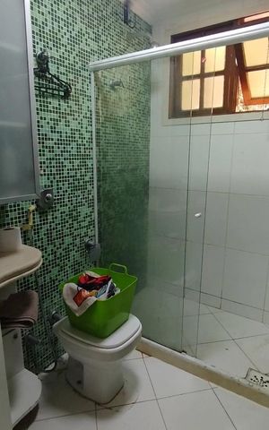 Casa à venda com 200m², 3 quartos e 2 vagas Casa à venda com 200m², 3 quartos e 2 vagasBanheiro 1