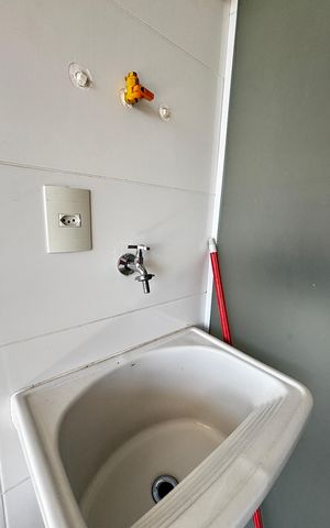 Apartamento à venda com 64m², 2 quartos e 1 vaga Apartamento à venda com 64m², 2 quartos e 1 vagaCozinha e Área de Serviço