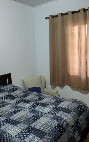 Casa à venda com 150m², 4 quartos e 2 vagas Casa à venda com 150m², 4 quartos e 2 vagasQuarto