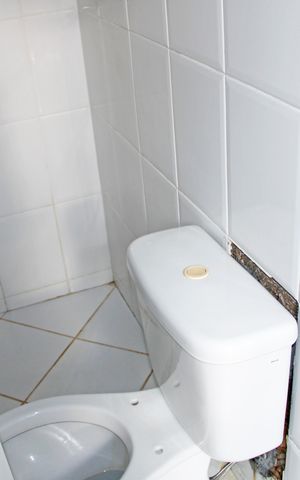 Casa de condomínio para alugar com 320m², 3 quartos e 4 vagasBanheiro Serviço