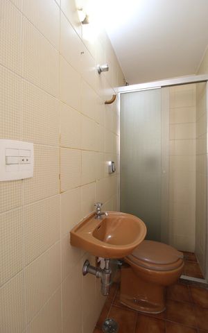 Apartamento à venda com 236m², 4 quartos e 4 vagasBanheiro de Serviço