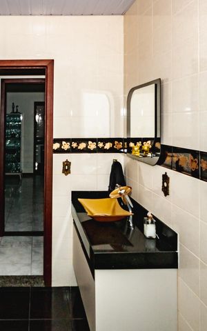 Casa à venda com 386m², 4 quartos e 4 vagasBanheiro Social