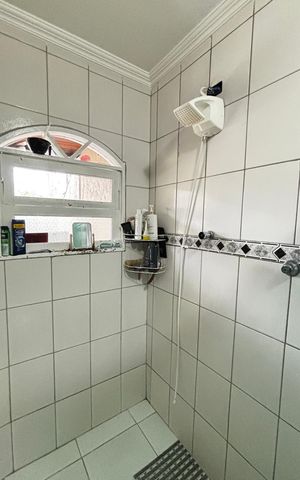 Casa à venda com 223m², 4 quartos e 2 vagas Casa à venda com 223m², 4 quartos e 2 vagasBanheiro da Suíte