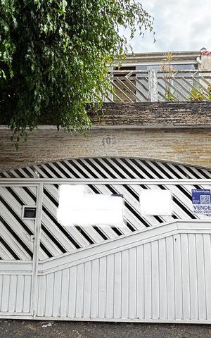 Casa à venda com 223m², 4 quartos e 2 vagas Casa à venda com 223m², 4 quartos e 2 vagasFachada