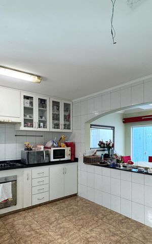 Casa à venda com 120m², 3 quartos e 2 vagas Casa à venda com 120m², 3 quartos e 2 vagasCozinha