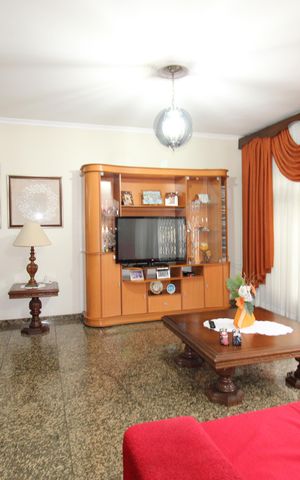 Casa à venda com 299m², 5 quartos e 4 vagasSala