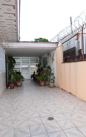 Casa à venda com 299m², 5 quartos e 4 vagasQuintal