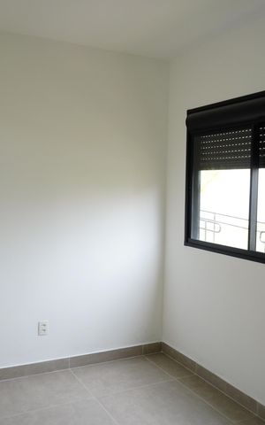 Casa de condomínio para alugar com 74m², 2 quartos e 1 vagaQuarto 1