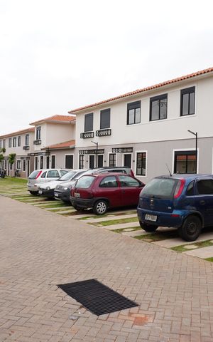Casa de condomínio para alugar com 74m², 2 quartos e 1 vagaFachada do Prédio plaquinha KJFK - 267