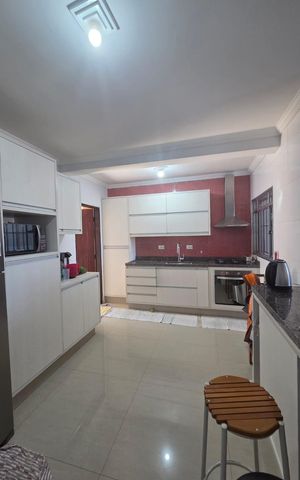 Casa à venda com 125m², 2 quartos e 2 vagas Casa à venda com 125m², 2 quartos e 2 vagasCozinha