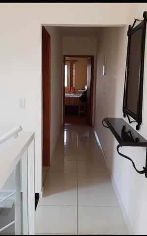 Casa à venda com 125m², 2 quartos e 2 vagas Casa à venda com 125m², 2 quartos e 2 vagasCorredor