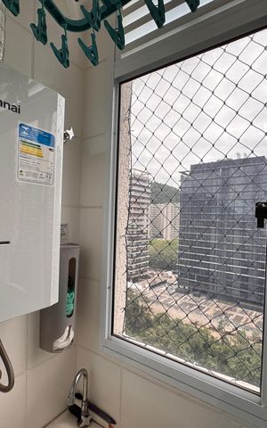 Apartamento à venda com 44m², 2 quartos e 1 vaga Apartamento à venda com 44m², 2 quartos e 1 vagaCozinha e Área de Serviço