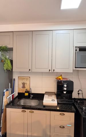 Apartamento à venda com 44m², 2 quartos e 1 vaga Apartamento à venda com 44m², 2 quartos e 1 vagaCozinha e Área de Serviço