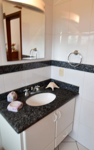 Casa de condomínio à venda com 460m², 5 quartos e 10 vagasBanheiro Suíte