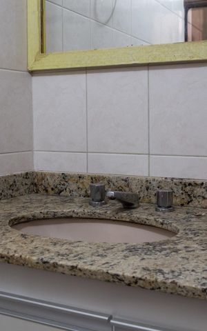 Apartamento para alugar com 130m², 3 quartos e 4 vagasBanheiro do Quarto 1 suíte