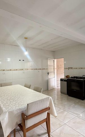 Casa à venda com 130m², 2 quartos e 2 vagasSala e cozinha