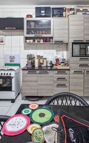 Casa à venda com 113m², 2 quartos e 2 vagas Casa à venda com 113m², 2 quartos e 2 vagasCozinha