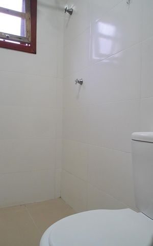 Casa para alugar com 55m², 2 quartos e 2 vagasBanheiro da Suíte